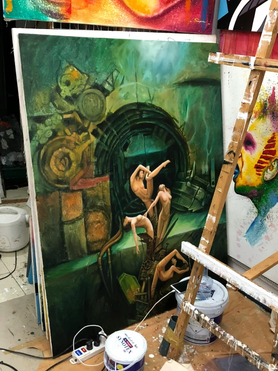 a couple of paintings sitting on top of a table, a surrealist painting, inspired by Jules Chéret, work in progress, a portal to the depths, oil on canvas 8 k, art station”