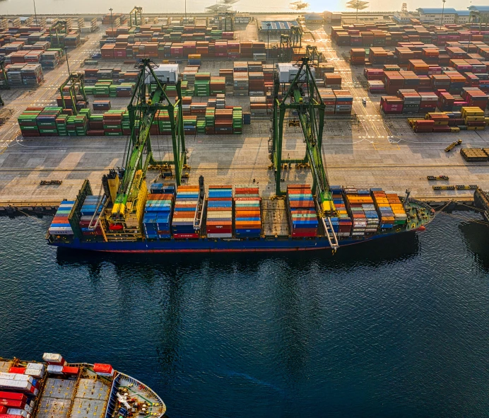 a large cargo ship in a large body of water, pexels contest winner, figuration libre, shipping docks, hyper detailed, graphic print, 1 petapixel image