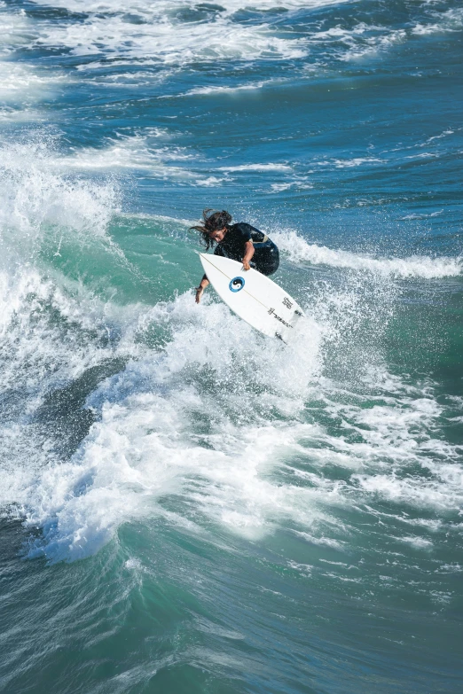 a man riding a wave on top of a surfboard, golden bay new zealand, taken in 2 0 2 0, crashing waves, reefs