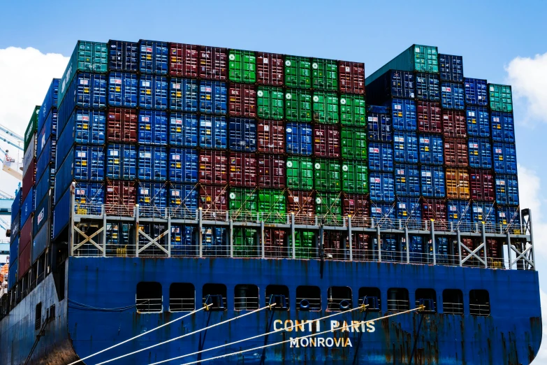 a large container ship loaded with lots of containers, a portrait, by Meredith Dillman, pexels, constructivism, 1 6 x 1 6, blue, color ( sony a 7 r iv, colorful”