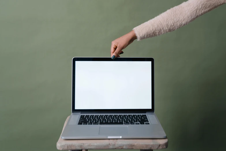 a person holding a laptop with a white screen, by Carey Morris, trending on pexels, rectangle, carrying a tray, bump in form of hand, digitally painted