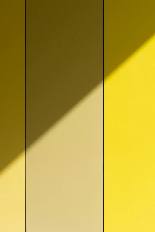 a white toilet sitting in a bathroom next to a yellow wall, by Doug Ohlson, conceptual art, shadow gradient, panels, 1 0 2 4 farben abstract, abstract photography