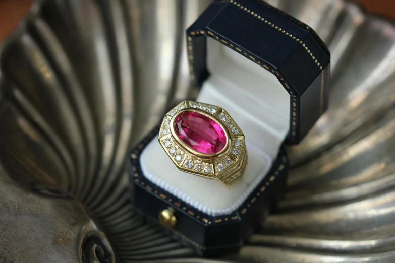 a close up of a ring in a box, a portrait, pixabay, renaissance, vibrant pink, 🕹️ 😎 🚬, very handsome, 1 9 2 0's