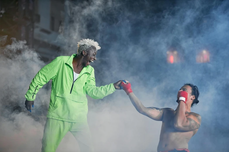 a couple of men standing next to each other, pexels contest winner, figuration libre, clowns boxing, young thug, sweaty. steam in air, neon colored suit
