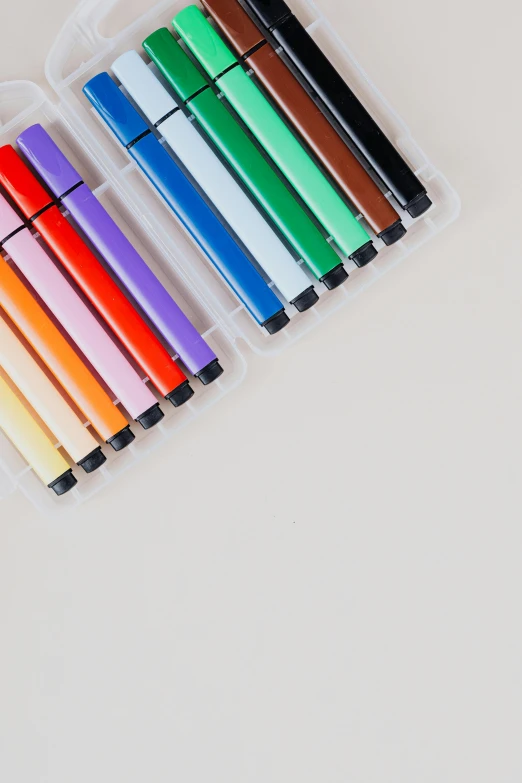 a bunch of pens sitting on top of a table, detailed product image, colorful]”, moderate colors, minimalistic aesthetics
