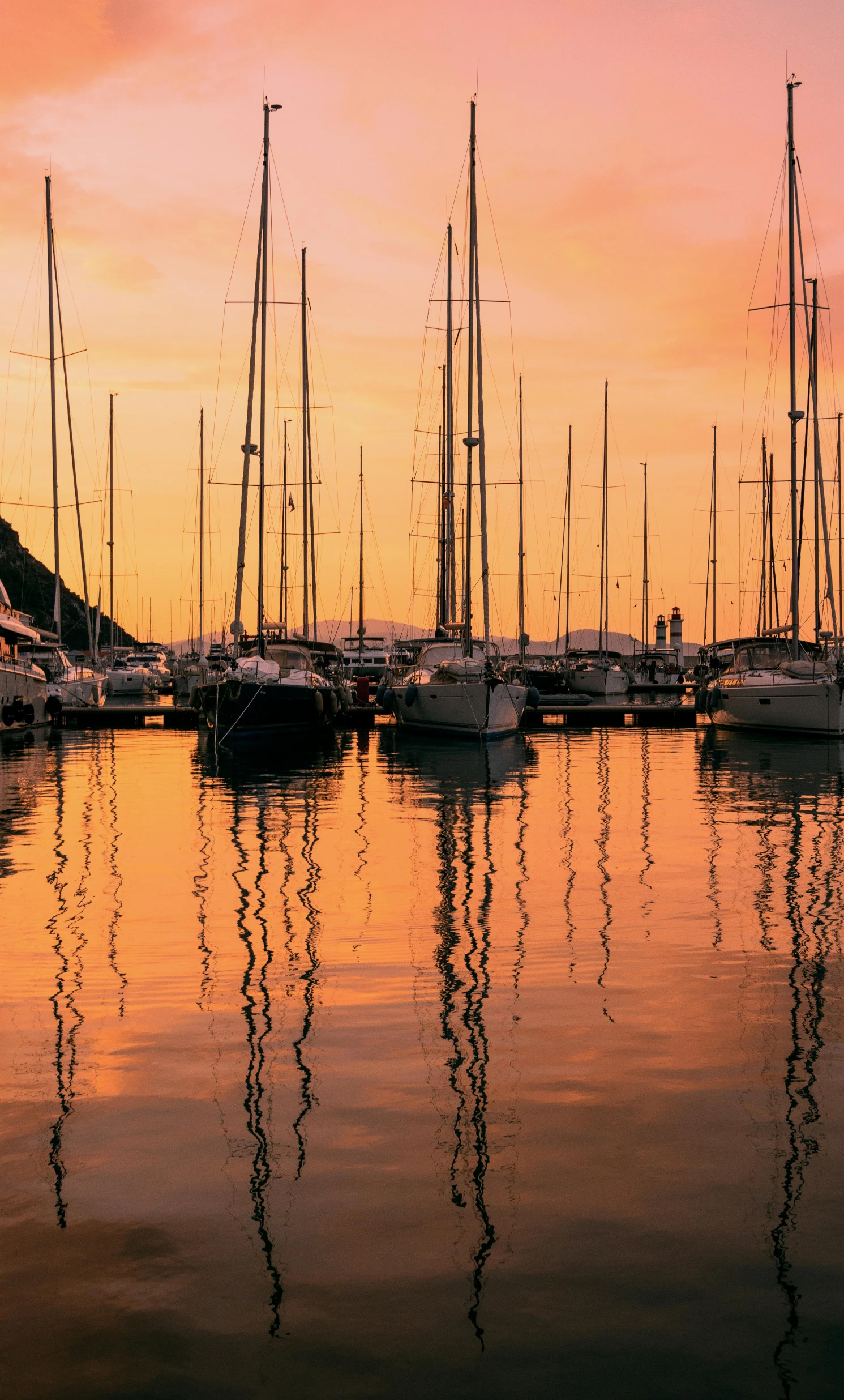 a number of boats in a body of water, at the sunset, monaco, digital image, reflecting