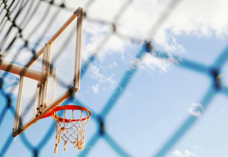 a basketball hoop is seen through a chain link fence, pexels contest winner, thumbnail, let's play, shot in the sky, hyper-realistic render