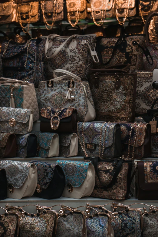 a bunch of purses stacked on top of each other, a picture, trending on unsplash, maximalism, ornate patterns, tehran, taken in the late 2000s, profile pic