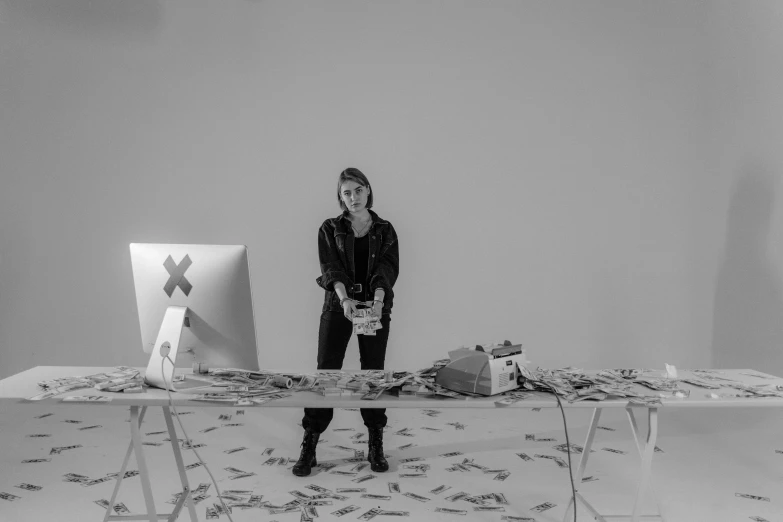 a woman that is standing in front of a table, a black and white photo, trash, tools, digital artist, money