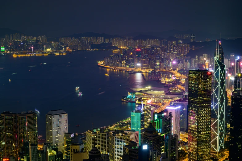 an aerial view of a city at night, pexels contest winner, hyperrealism, city like hong kong, slide show, high resolution, a cozy