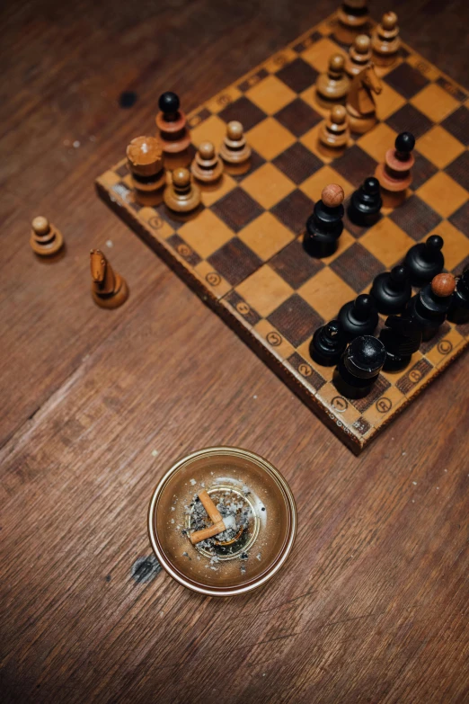 a wooden chess board sitting on top of a wooden table, by Sven Erixson, unsplash, assemblage, smoking a bowl of hash together, photograph credit: ap, azamat khairov, asleep