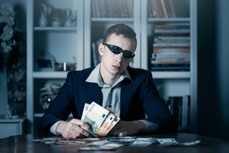 a man in a suit sitting at a table with money, pexels contest winner, surrealism, wearing blue sunglasses, casual game, avatar image, action thriller