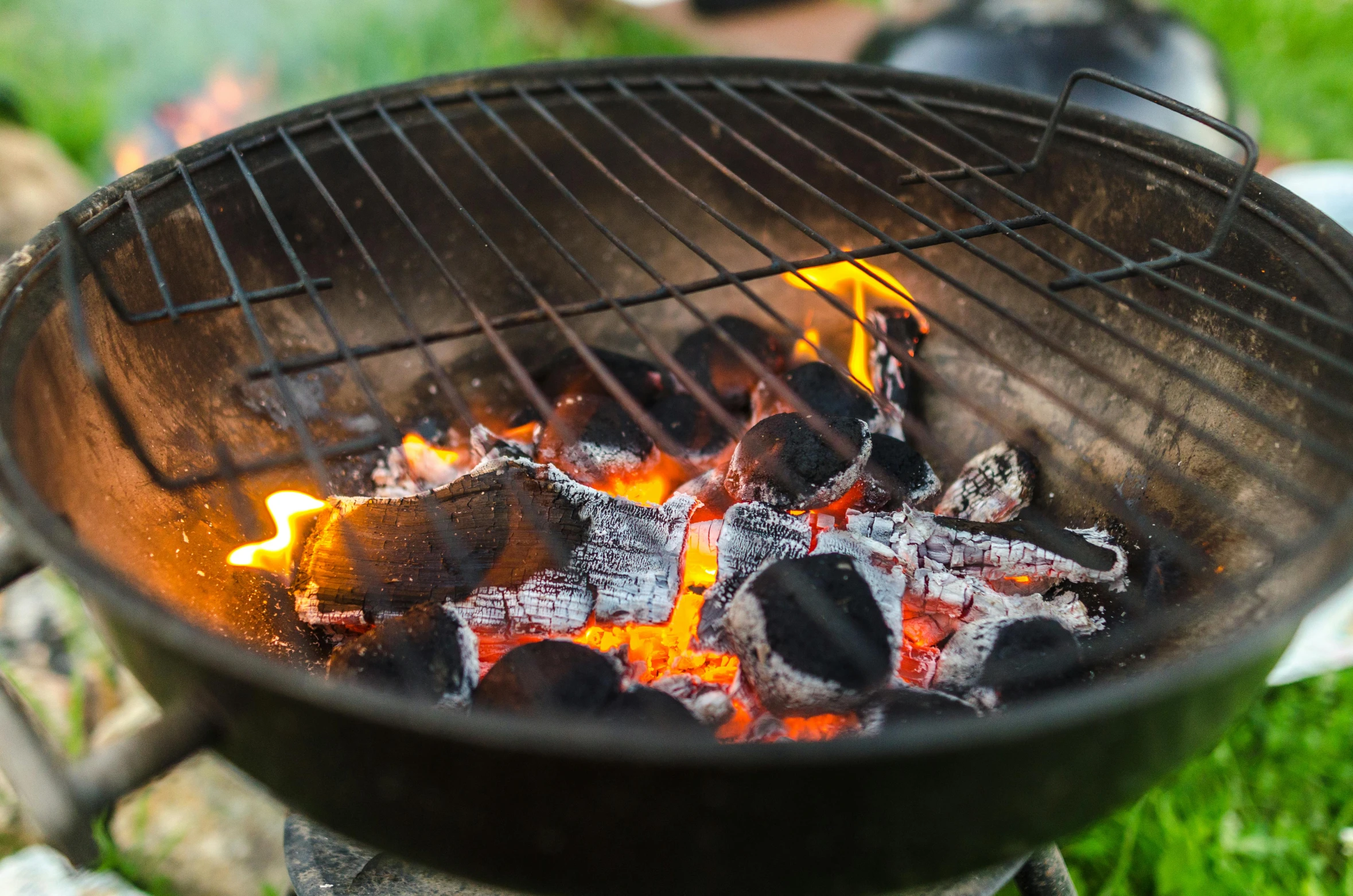 a close up of a grill with charcoal and fire, pexels contest winner, bowl filled with food, “ iron bark, paul davey, college