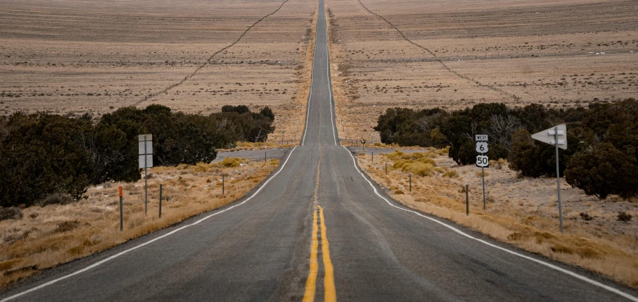 an empty road in the middle of the desert, unsplash contest winner, hyperrealism, split in half, ignant, thumbnail, seen from the long distance
