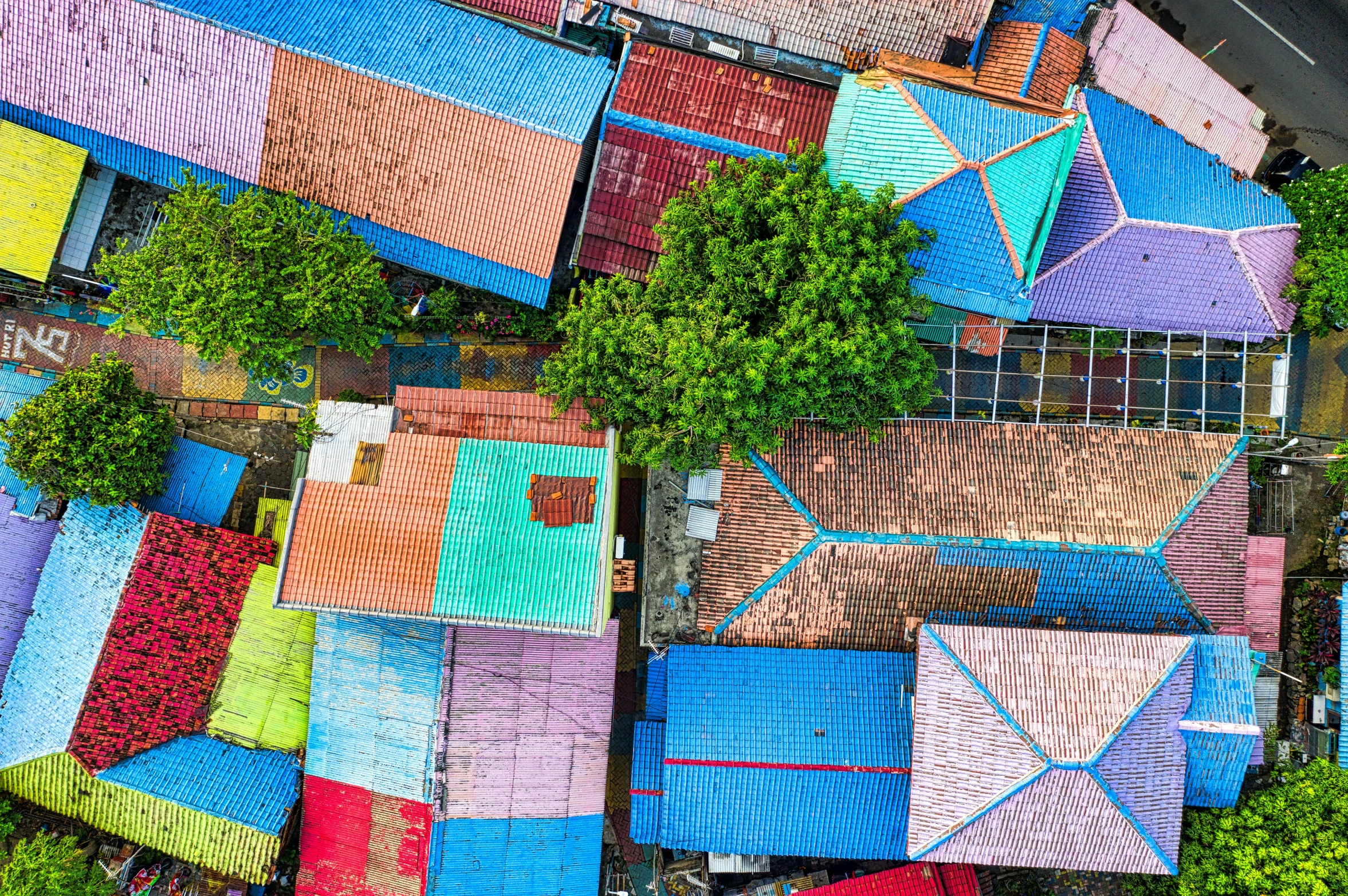 a bird's eye view of a colorful building, indonesia, hiding in the rooftops, square, extremely high resolution