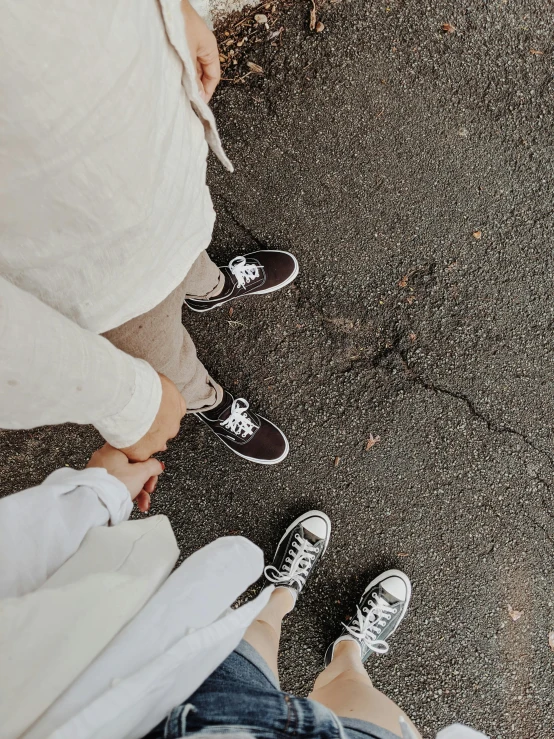 a couple of people standing next to each other, trending on unsplash, no shoes, 🤬 🤮 💕 🎀, childhood friend vibes, van