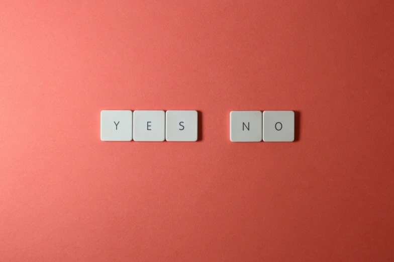 two white tiles spelling yes and no on a red background, by Caro Niederer, trending on unsplash, neoism, board games, pink, no arms, gray