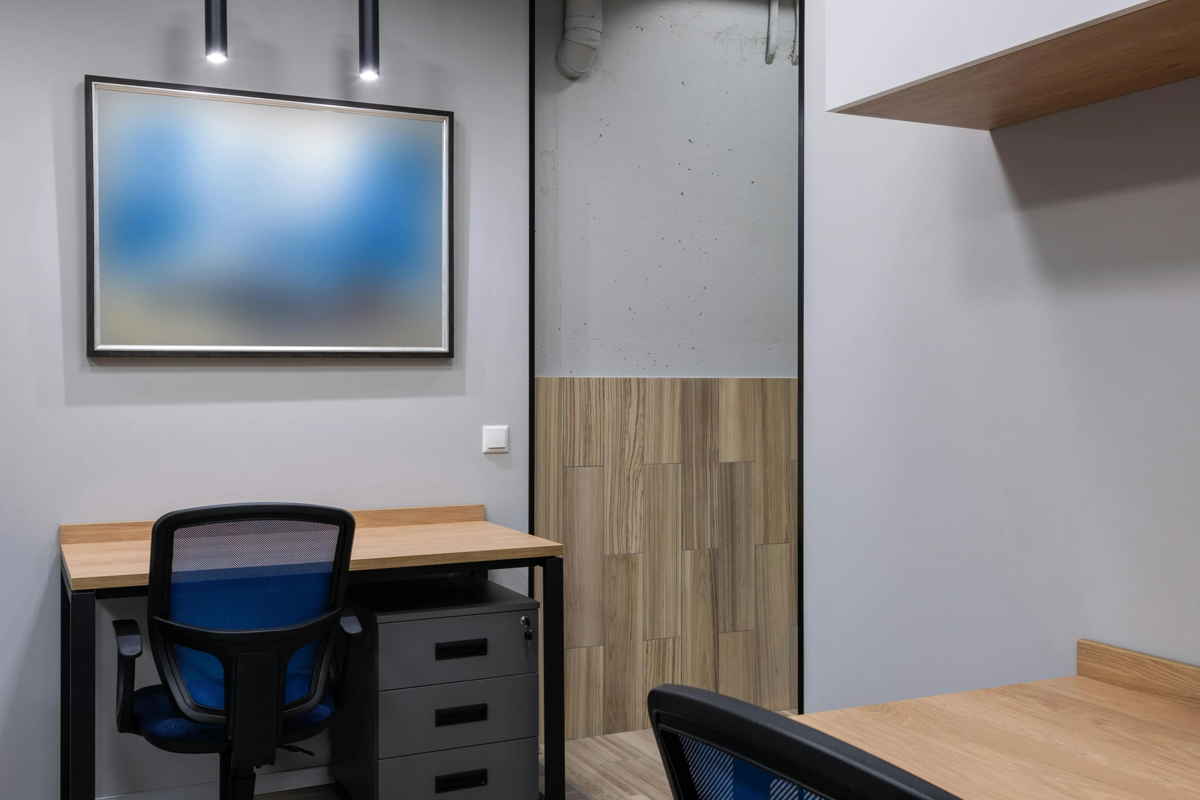 a room with a desk a chair and a picture on the wall, a picture, office ceiling panels, iq 4, thumbnail, blue and black scheme