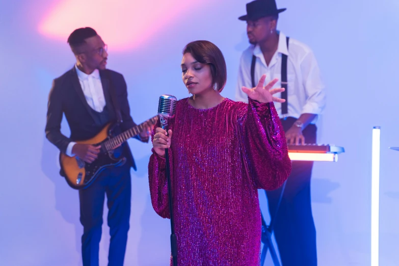 a woman in a red dress holding a microphone, an album cover, pexels, 3 jazz musicians, performing a music video, taken with sony alpha 9, pastel'