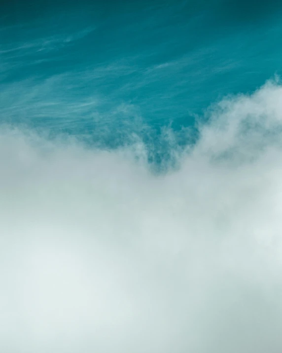 a man riding a wave on top of a surfboard, trending on unsplash, romanticism, sitting in a fluffy cloud, cyan fog, looking from slightly below, 3 layers of sky above each other