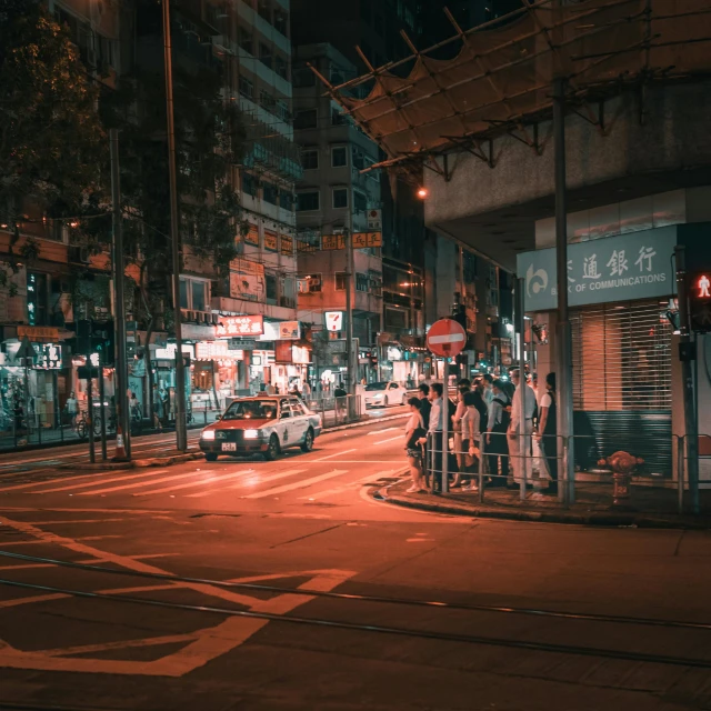a city street filled with lots of traffic at night, a picture, by Patrick Ching, pexels contest winner, hyperrealism, dark city bus stop, kowloon walled city style, gothic city streets behind her, street of teal stone