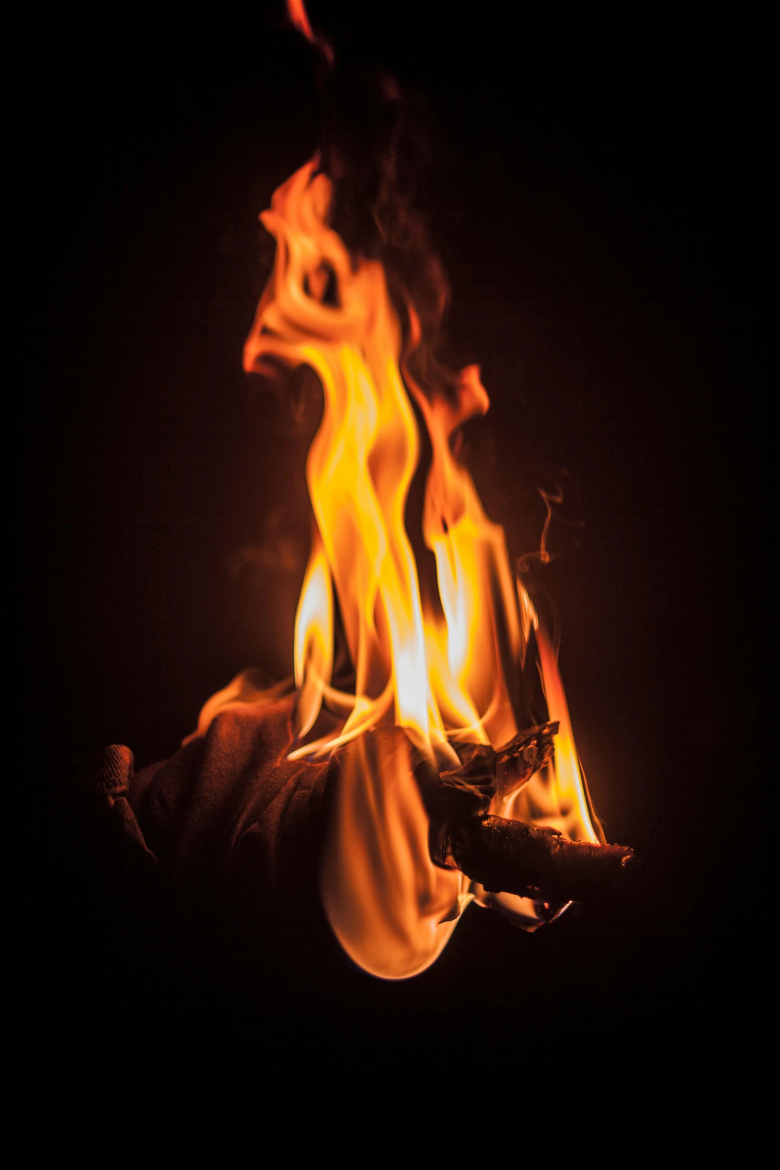 a fire that is burning in the dark, an album cover, by Jan Rustem, unsplash, renaissance, s'mores, headshot, up close shot, avatar image