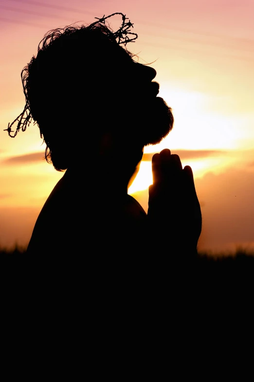 a silhouette of a man praying at sunset, by Matt Stewart, hurufiyya, wearing a turban, profile image, avatar image, hands