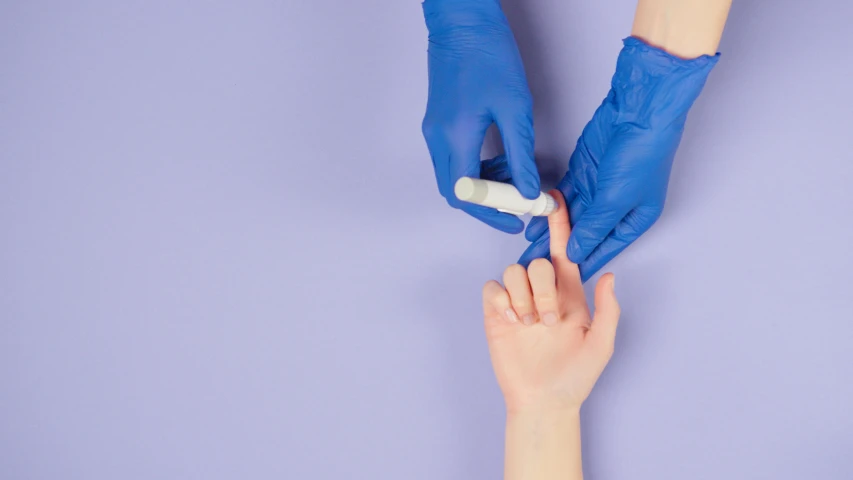 a woman getting her nails done by a doctor, by Gavin Hamilton, trending on pexels, plasticien, blue and purple, plain background, kid named finger, iv pole