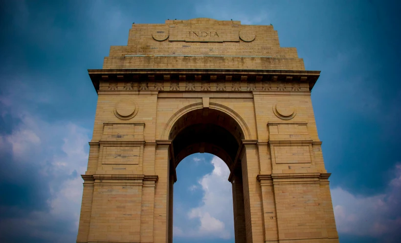 a view of the india gate in new delhi, pexels contest winner, art nouveau, square, brown, indigo, top