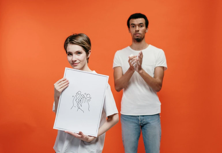 a man and a woman standing next to each other, a drawing, pexels contest winner, orange and white, holding it out to the camera, awkward situation, art set