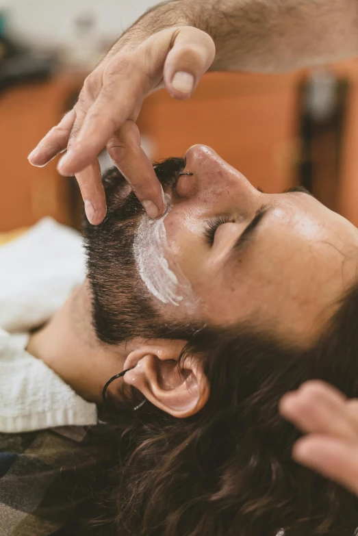 a man getting a shave in a barber shop, trending on pexels, renaissance, square masculine facial features, thumbnail, prosthetic makeup, fractal beard