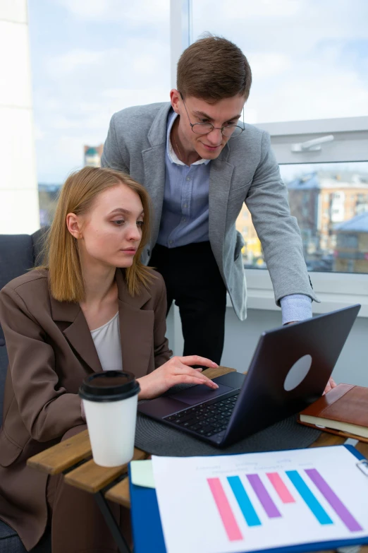 a man and a woman are looking at a laptop, trending on reddit, it specialist, 2019 trending photo, thumbnail, serious business