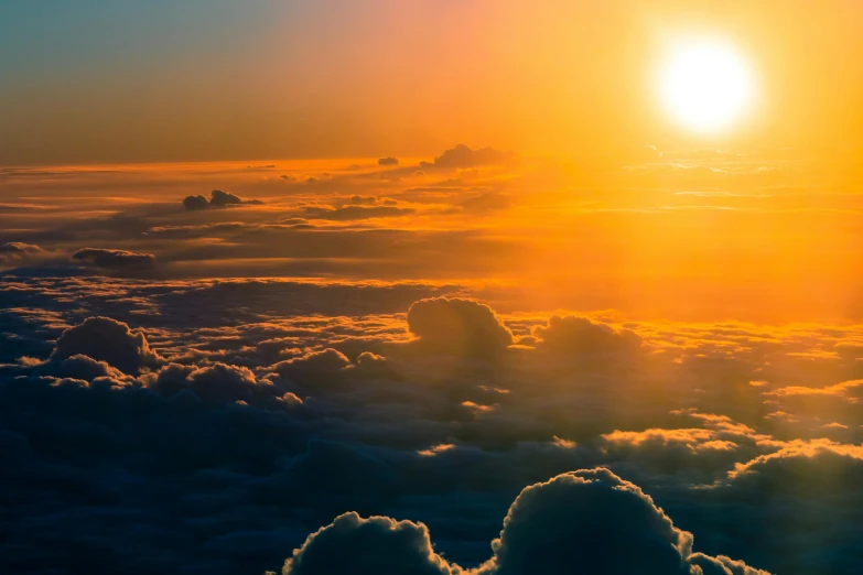 the sun is setting over the clouds in the sky, by Niko Henrichon, pexels contest winner, fan favorite, multiple suns, high - angle, photo high definition