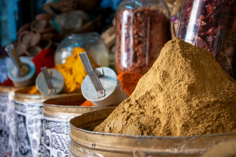 a couple of buckets filled with different types of spices, by Julia Pishtar, hurufiyya, fan favorite, moroccan city, thumbnail, up close