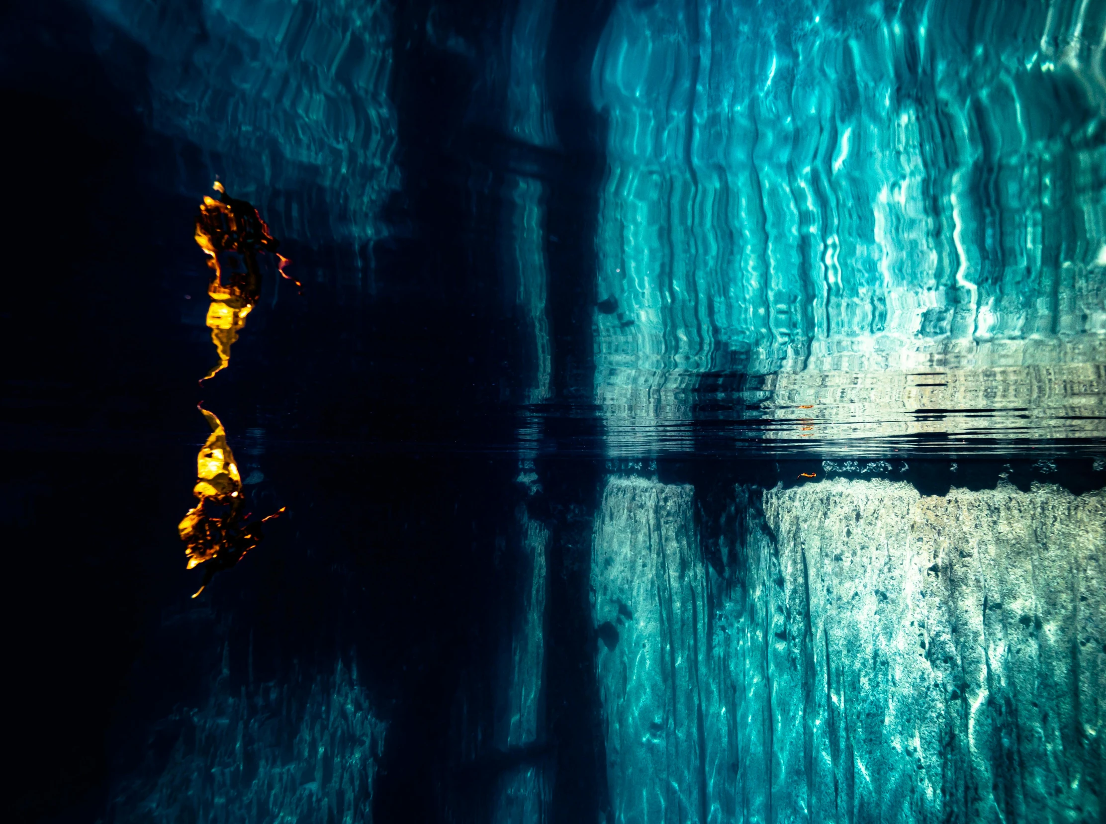 a reflection of a person in a body of water, inspired by Elsa Bleda, unsplash contest winner, abstract expressionism, dimly lit underground dungeon, gold and blue, iceland photography, water temple