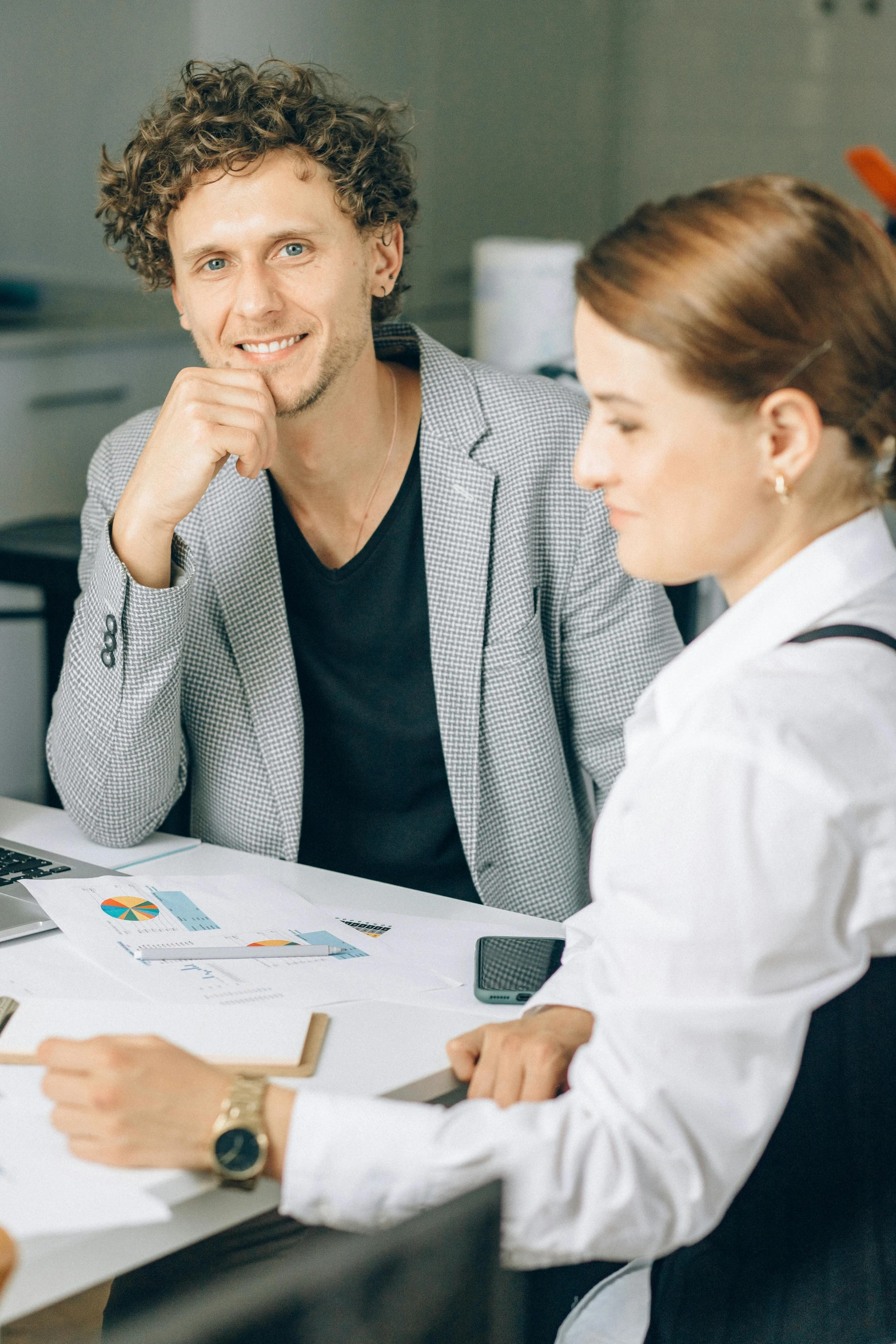 a group of people sitting around a table with laptops, a cartoon, pexels contest winner, renaissance, wearing business casual dress, portrait of two people, charts, dynamic closeup