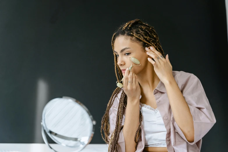 a woman shaving her face in front of a mirror, trending on pexels, hurufiyya, covered in plants, girl with plaits, avatar image, ad image