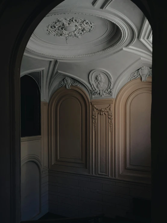 an empty room with a clock on the ceiling, a detailed matte painting, inspired by Luis Paret y Alcazar, unsplash contest winner, rococo, ignant, archway, alessio albi, hyperrealism photography