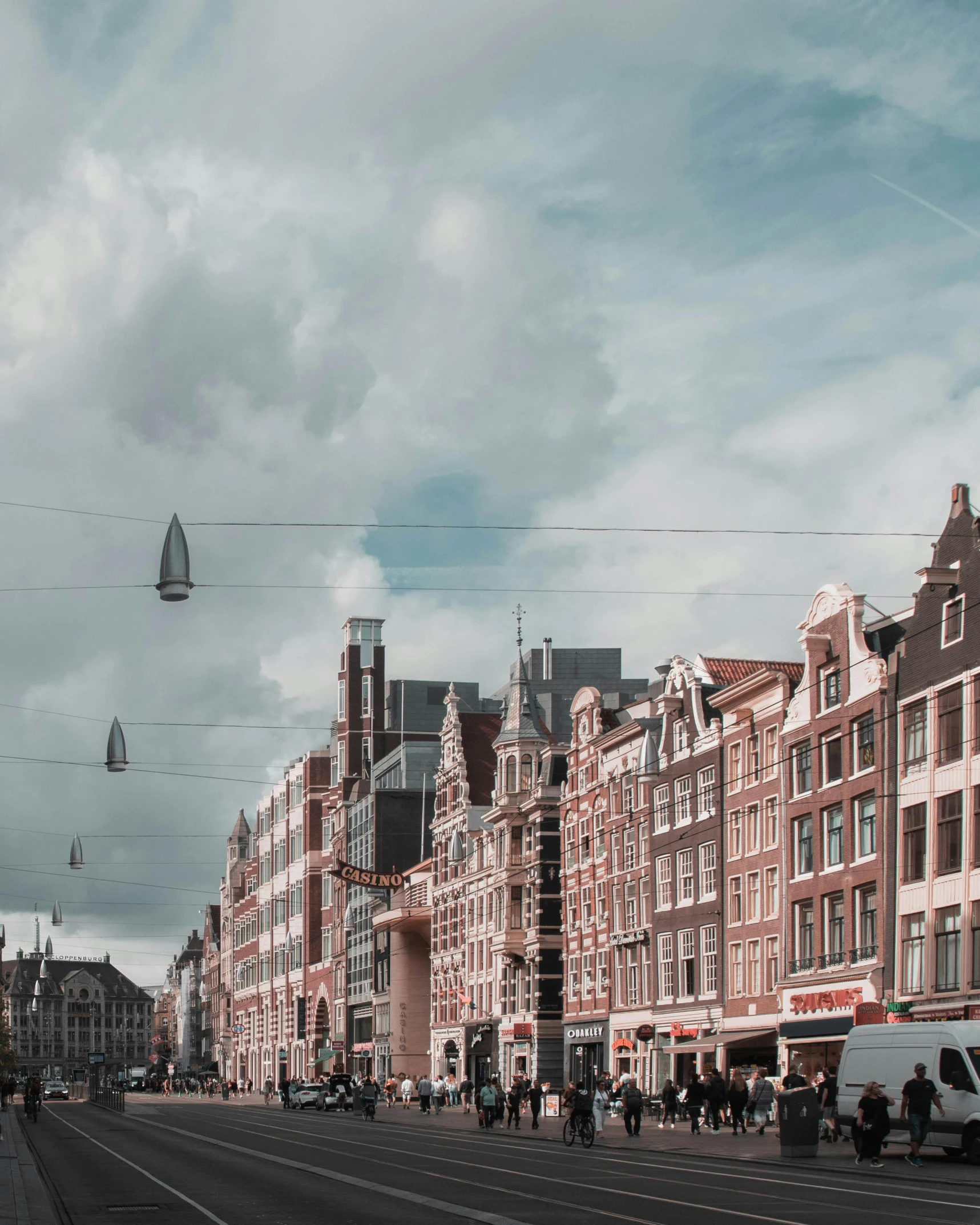 a city street filled with lots of tall buildings, by Adam Willaerts, pexels contest winner, happening, amsterdam, non-binary, thumbnail, background image