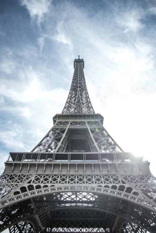 a view of the eiffel tower from below, pexels contest winner, fan favorite, super high resolution, day light, light show