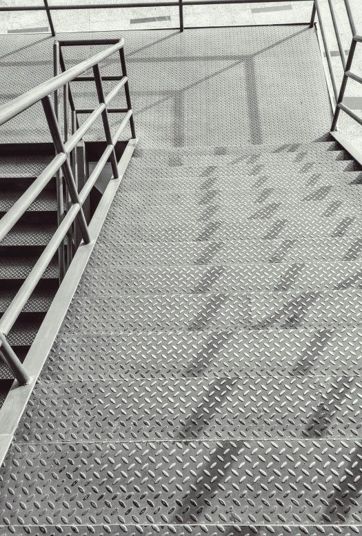 a black and white photo of a set of stairs, a stipple, worksafe. instagram photo, “diamonds, metal panels, taken in the late 2000s