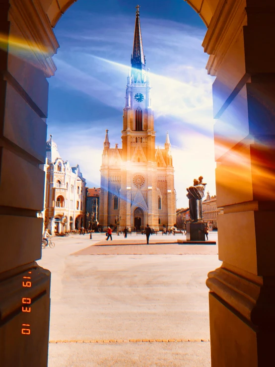 a large clock tower towering over a city, a picture, by Adam Marczyński, pexels contest winner, baroque, holy rays, in a square, shot on gopro9, gothic arch frame