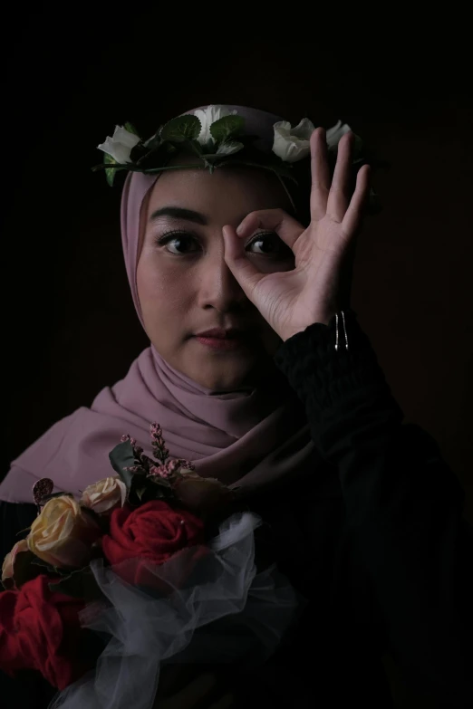 a woman with a flower crown on her head, a character portrait, by Basuki Abdullah, pexels contest winner, hyperrealism, wave a hand at the camera, queer woman, ( low key light ), ( ( theatrical ) )