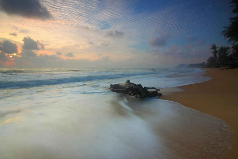 a boat sitting on top of a sandy beach, unsplash contest winner, romanticism, alien ship wreck, sri lanka, medium format, early morning