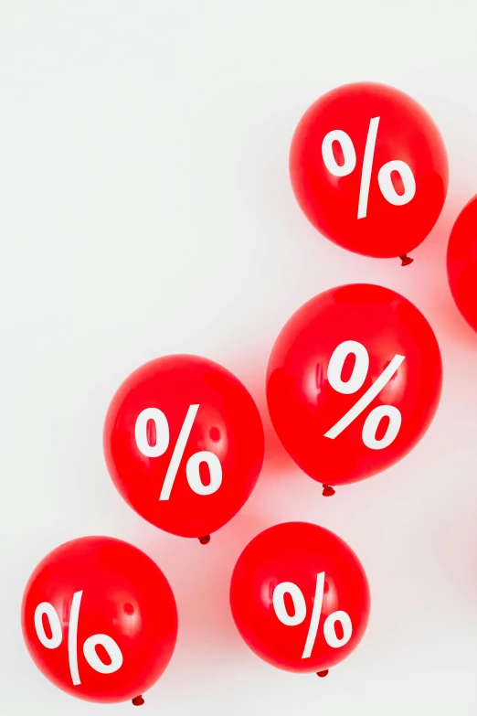 a bunch of red balloons with white numbers on them, a cartoon, trending on unsplash, currency symbols printed, crazy colors 1 0 %, david kassan, mathematics