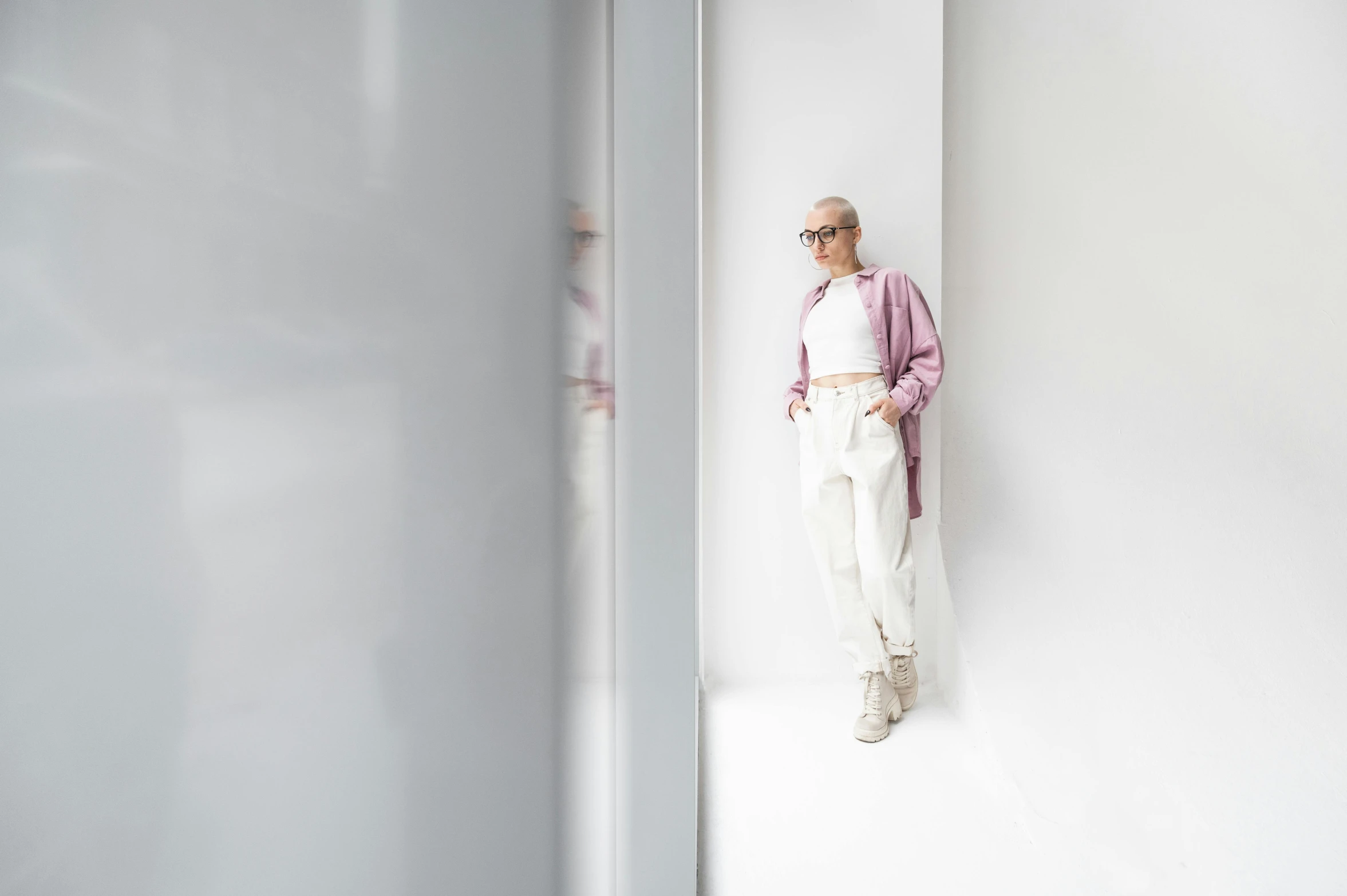 a woman leaning against a wall in a white room, an album cover, inspired by Richard Hamilton, unsplash, bauhaus, purple and pink leather garments, wearing lab coat and glasses, white pants, albino