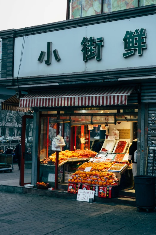 a fruit and vegetable stand on a city street, a silk screen, inspired by Wang Yi, trending on unsplash, warm street lights store front, tiananmen square, exterior photo, awnings