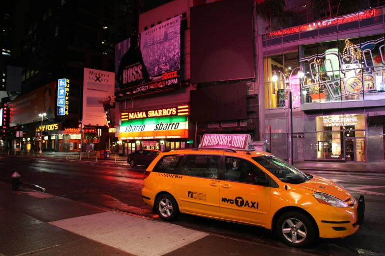 a taxi cab on a city street at night, imax, fan favorite, cosmopolitan, square