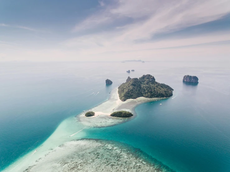 a small island in the middle of the ocean, by Adam Dario Keel, unsplash contest winner, thailand, jill stingray, mauve and cyan, thumbnail