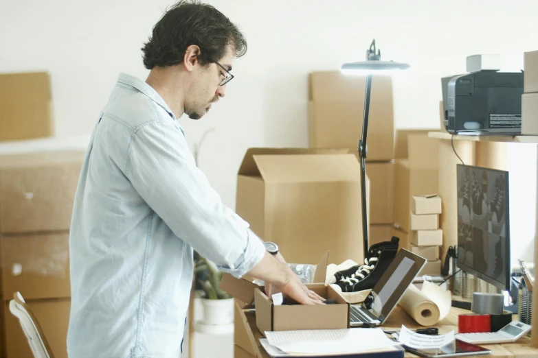 a man standing in front of a laptop computer, cardboard, inventory item, profile image, thumbnail